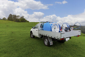 QYUIKSPRAY TWIN REEL SPRAYER ON BACK OF UTE